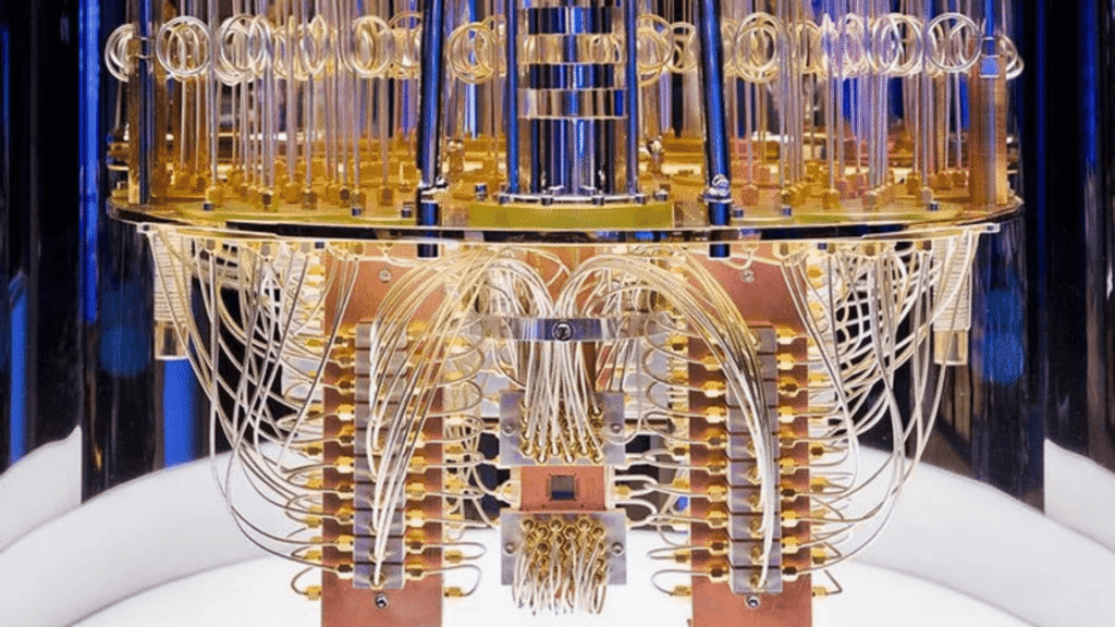 Real quantum computer IBM fridge system, showing the complex golden chandelier-like structure.